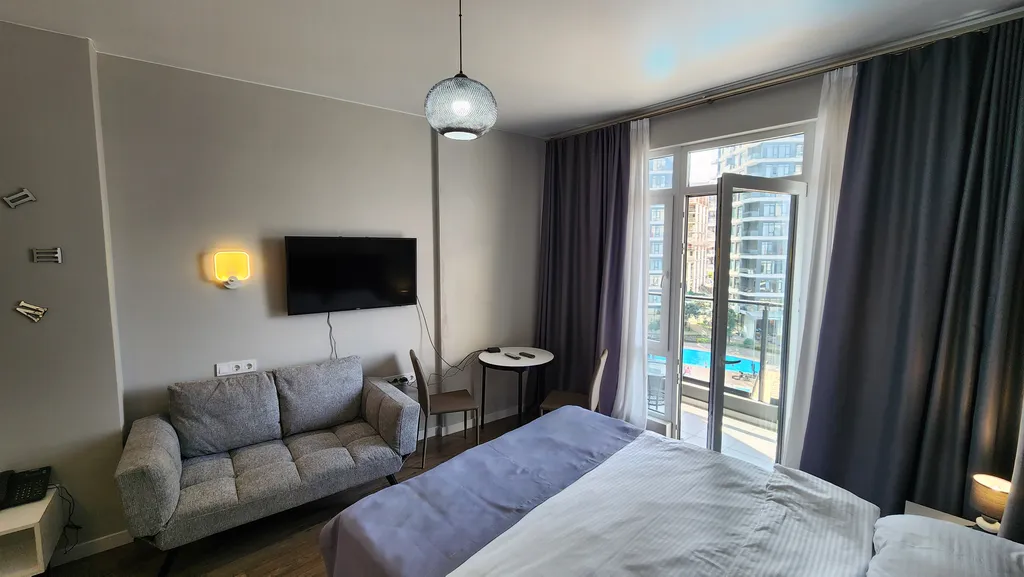 Апартамент с бассейном и видом на море