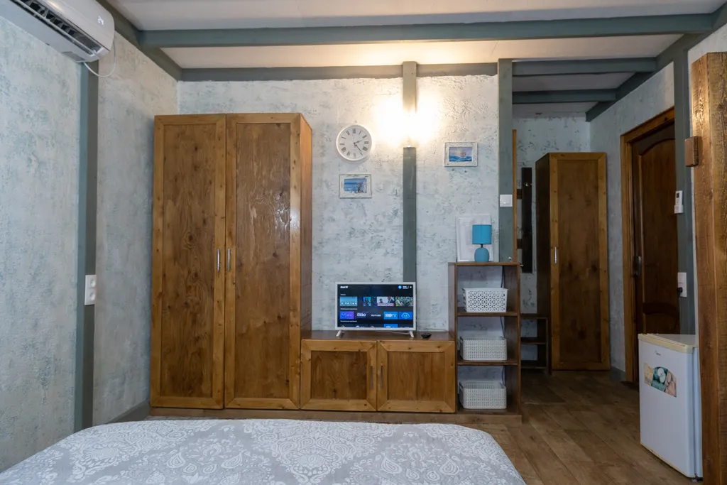 Квартира Квартира Четырёхместный номер с двуспальной и двухъярусной кроватями — Сухум