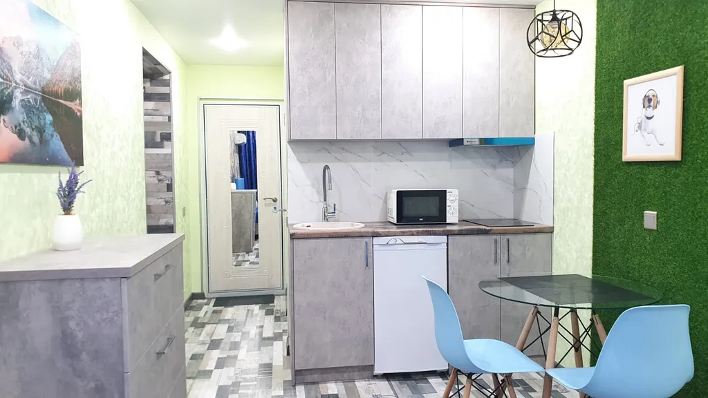 Новая квартира-студия в самом центре города с дизайнерским ремонтом