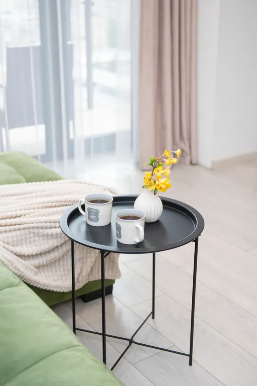 Уютные апартаменты с видом на колесо обозрения и город