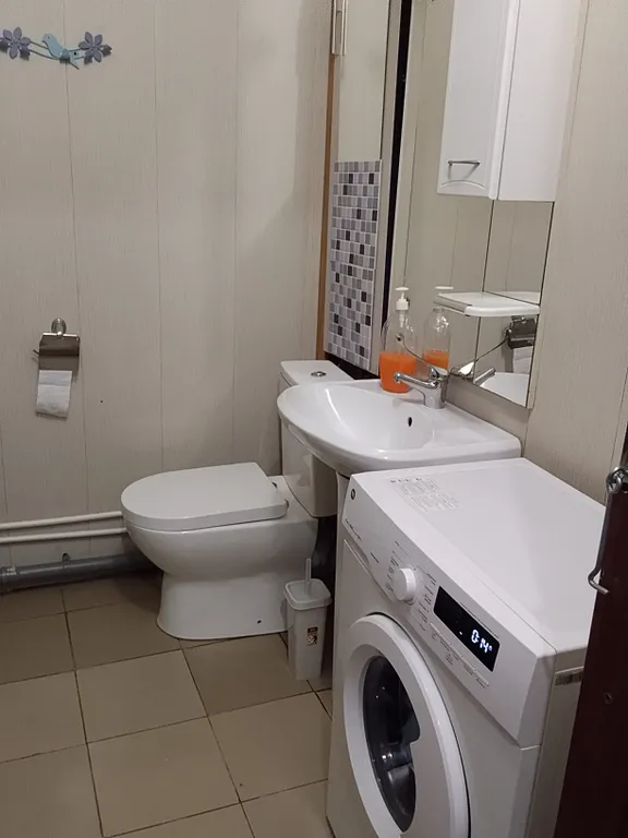 Студия в современном новом доме на проспекте Строителей