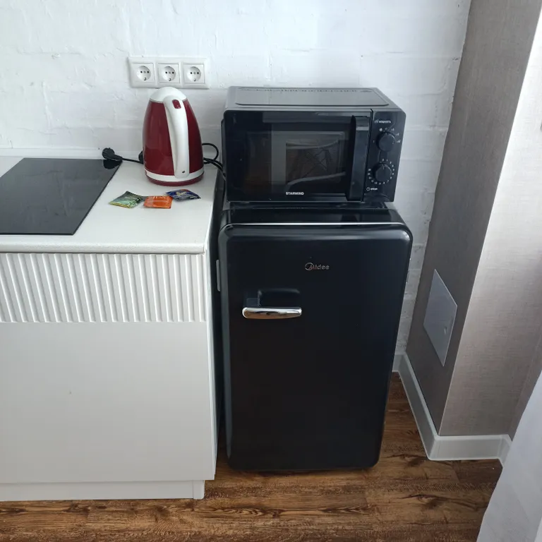 Уютная студия в зеленом массиве