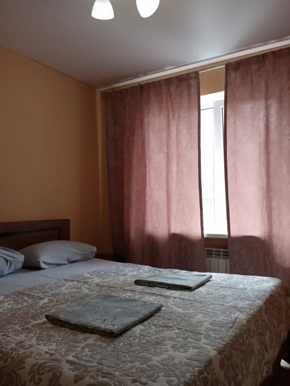 Квартира с видом на набережную и горы