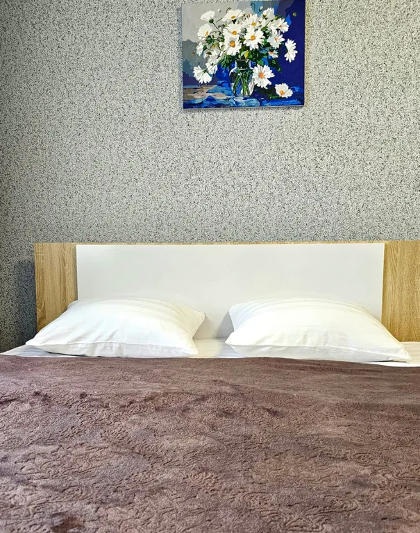 Квартрира с видом на закат солнца и горы