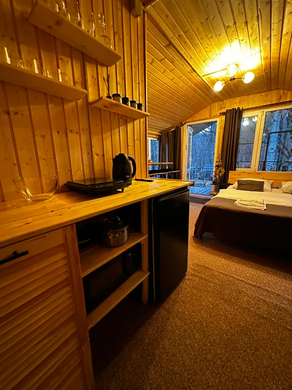 Коттедж Уютный домик с панорамными окнами с видом на лес — Архыз