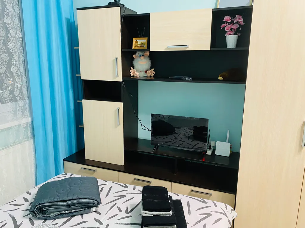 Уютная квартира с прекрасным видом на город в огнях