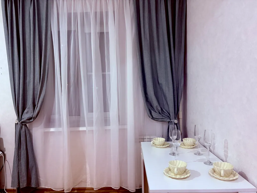 Квартира Уютная двухкомнатная квартира на бульваре — Волгоград