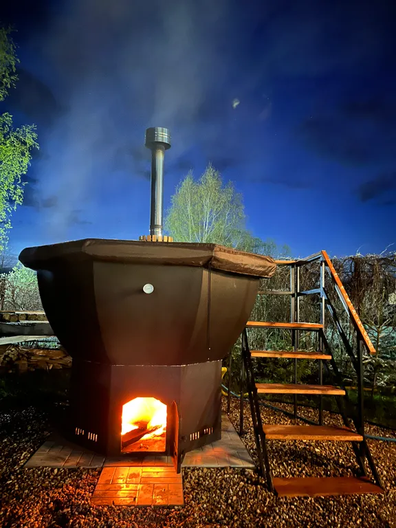 Уютный современный дом с террасой и банным чаном на участке 17 соток