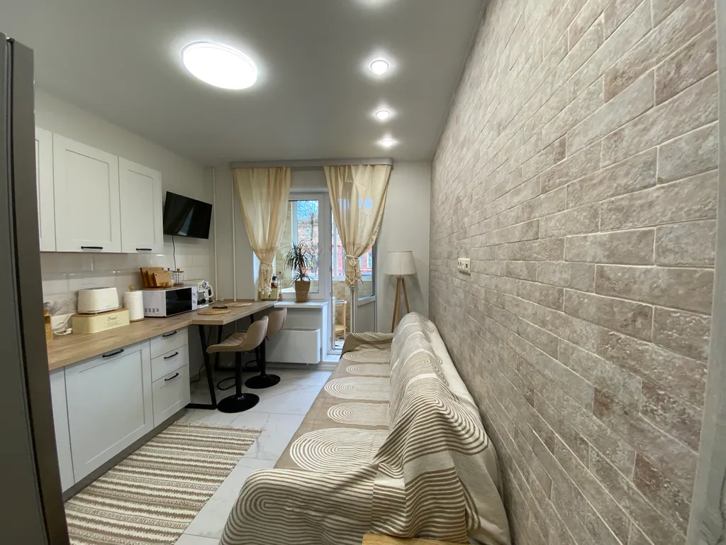 Апартамент Сканди с балконом и отдельной спальней