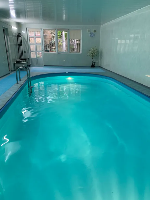 Коттедж Коттедж Уютная студия с бассейном и сауной — Адлер