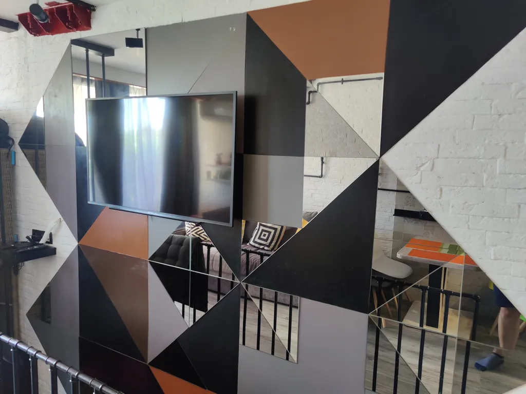 Просторный двухуровневый апартамент в стиле лофт в комплексе Меридиан