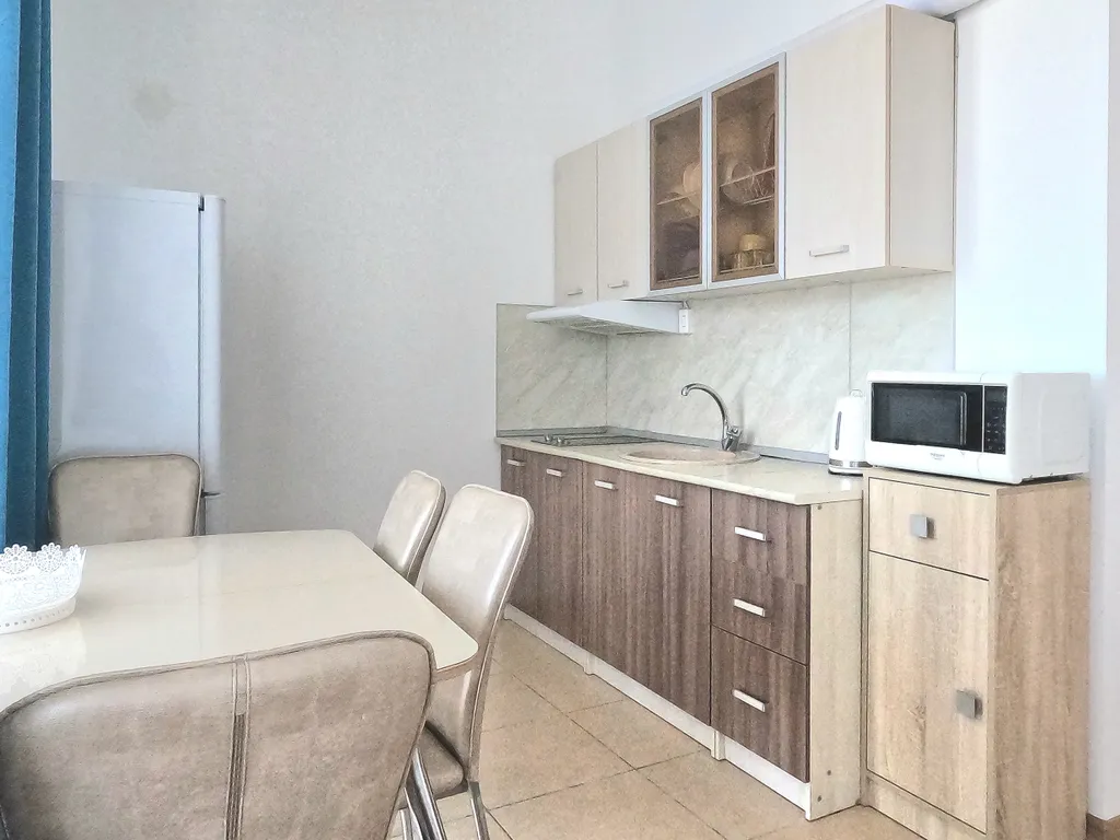 Студия с балконом и видом на синее море и горы