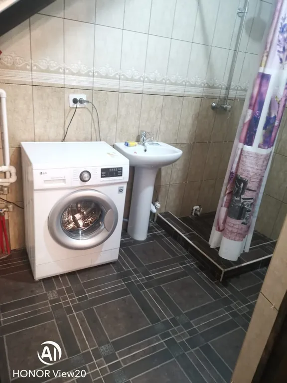 Уютный 3-х этажный коттедж в центре Домбая