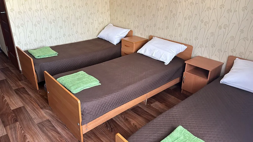 Трехместный номер с видом на сад