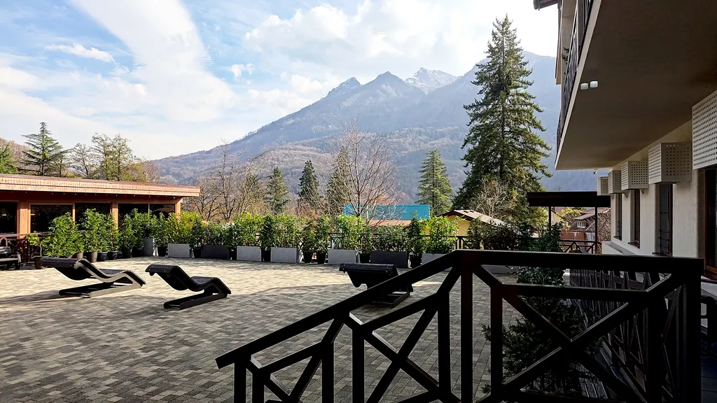 Студия с персональным выходом к шезлонгам - и вы любуетесь горами