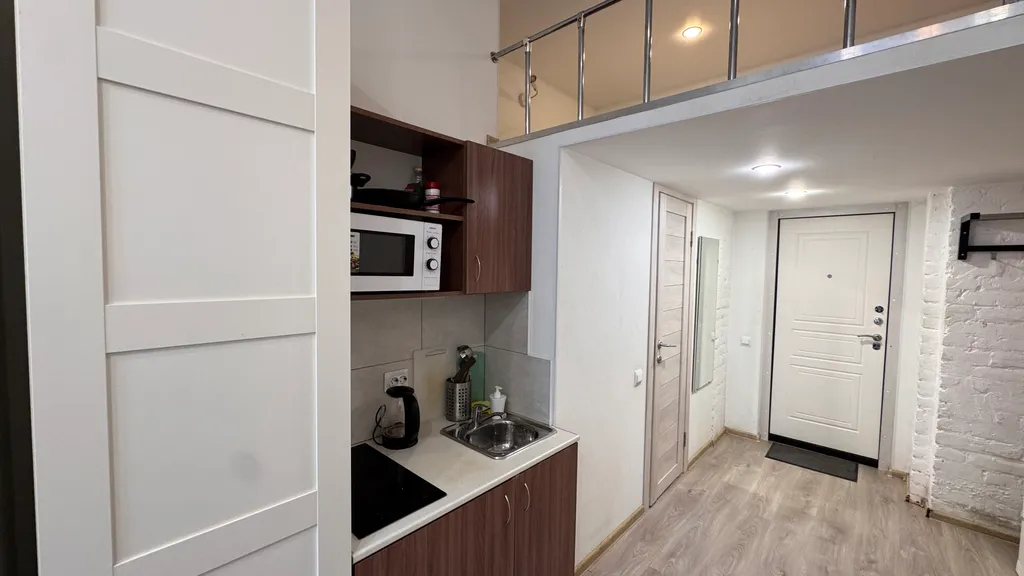 Двухуровневая квартира-студия в центре города