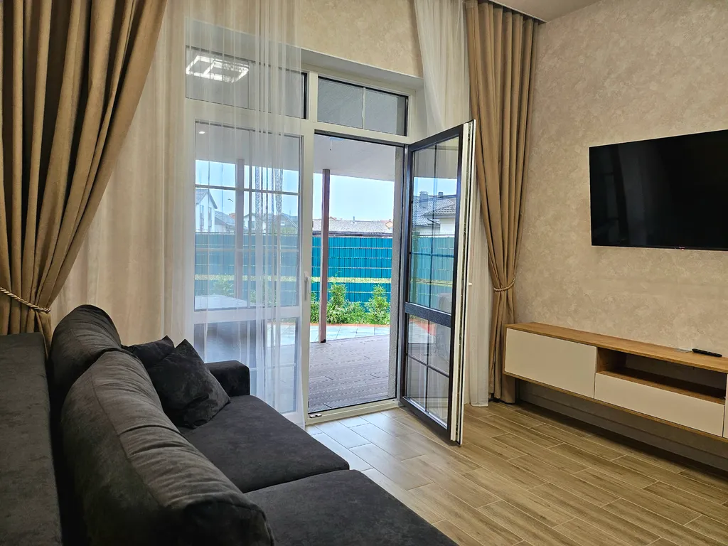 Домик у моря с зоной барбекю