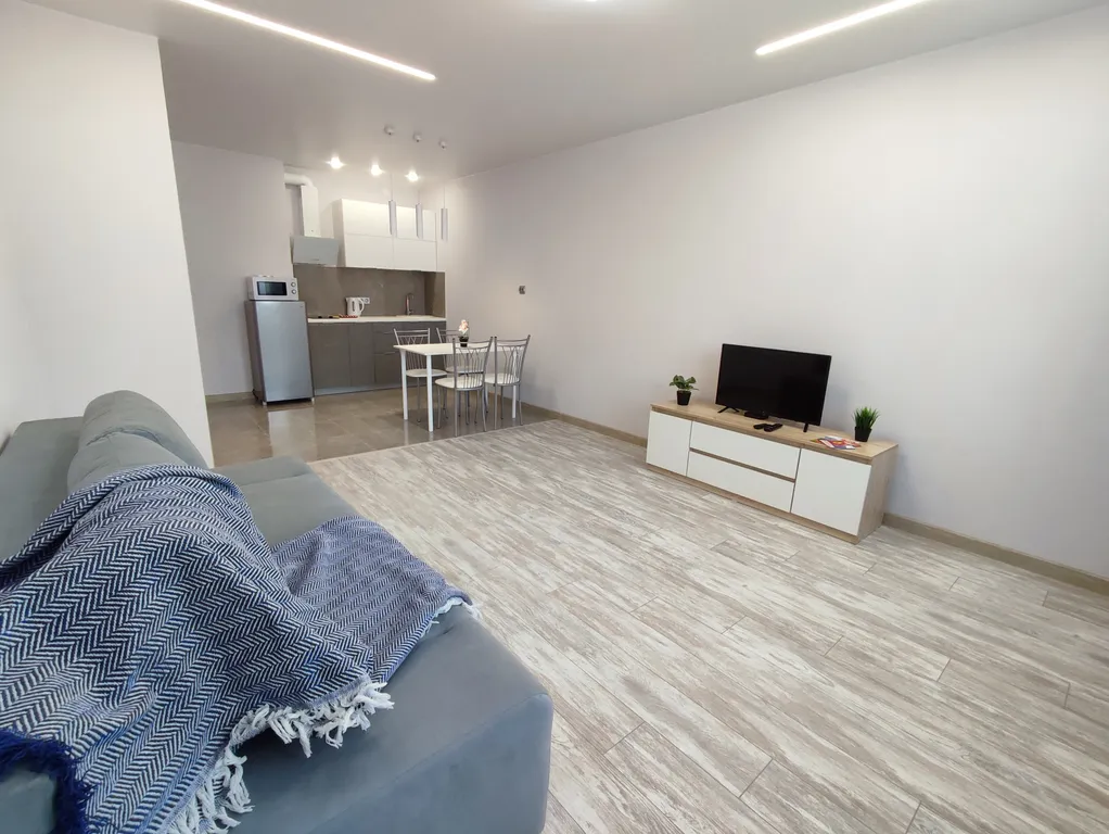 Комфортные апартаменты с дизайнерским ремонтом