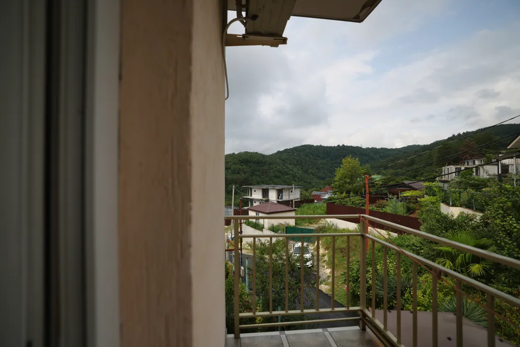 Квартира Трехместный номер с доп. местом с балконом и видом на горы — Лазаревское