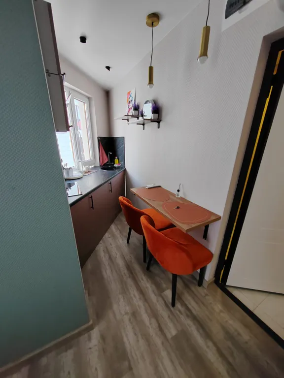 Уютная и стильная студия с отдельной кухней