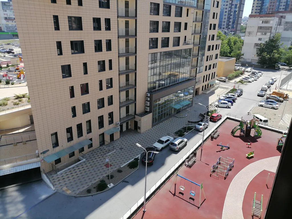 Резиденция на первой линии около Хилтона