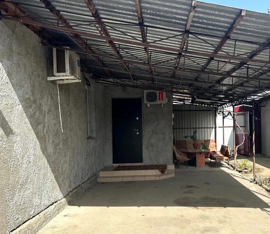 Уютная часть дома с просторным местом отдыха вблизи термальных вод