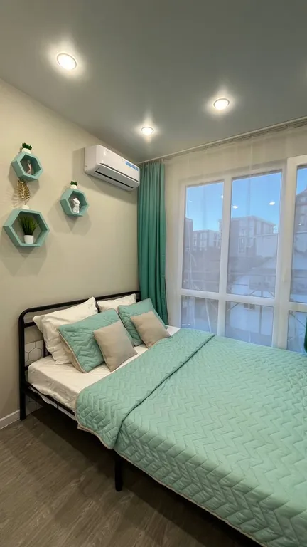 Студия для двоих с панорамным окном