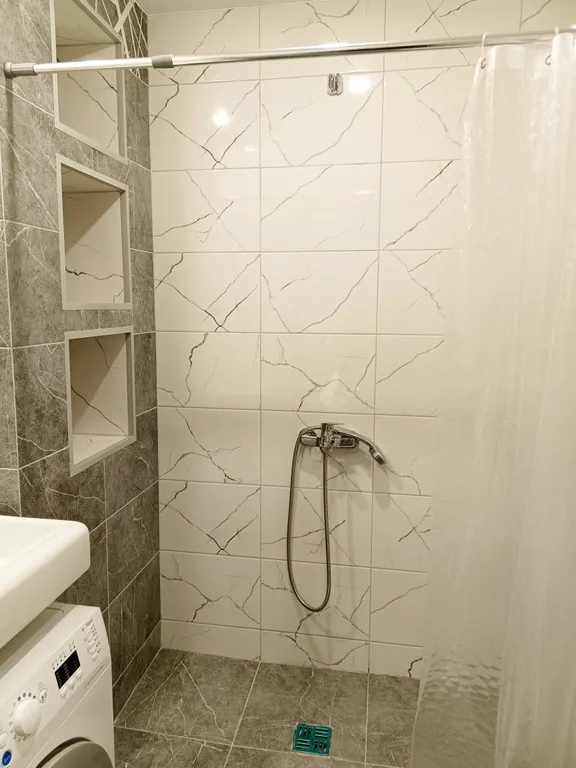 Уютная студия в новом доме с видовым балконом