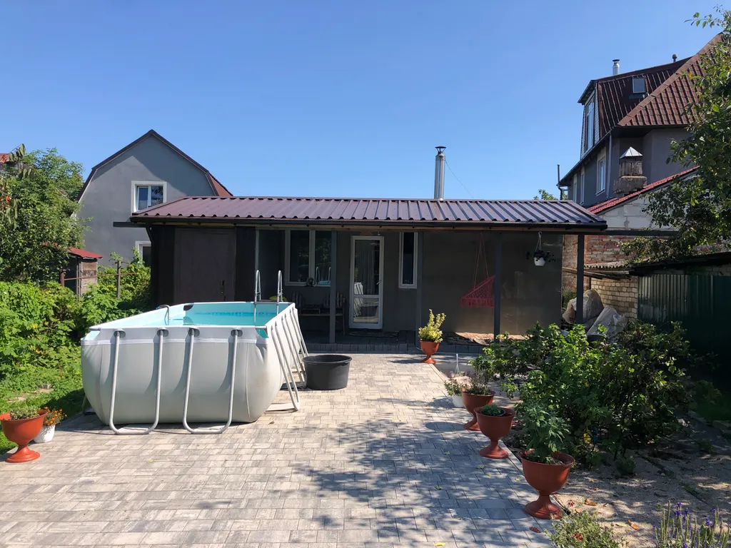 Дом в черте города в тихом дачном обществе