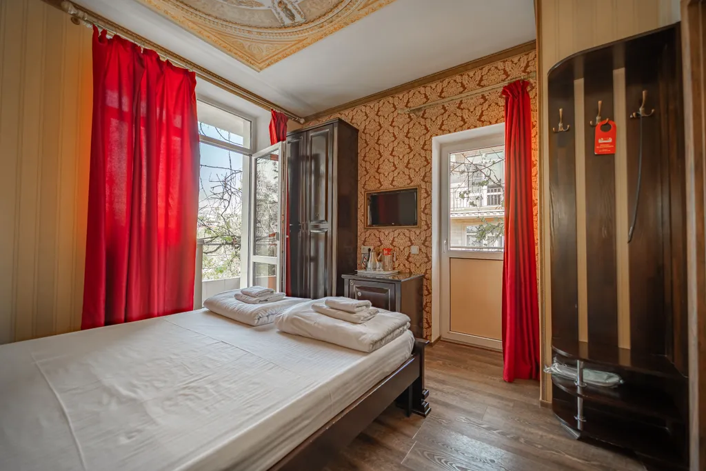 Двухместная комната с двуспальной кроватью НР