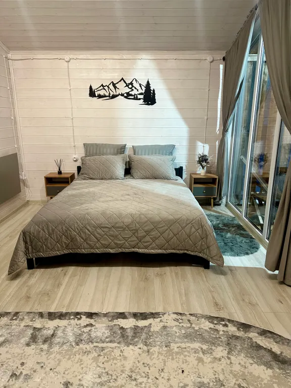 Коттедж Коттедж Уютный барнхаус с большими панорамными окнами — Архыз