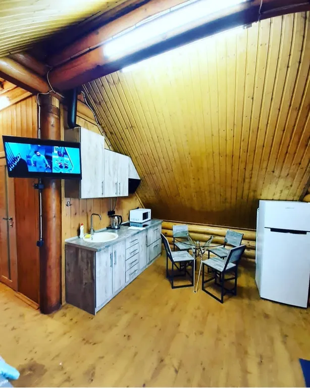 Квартира Мансардная квартира-студия в доме из сруба — Севастополь