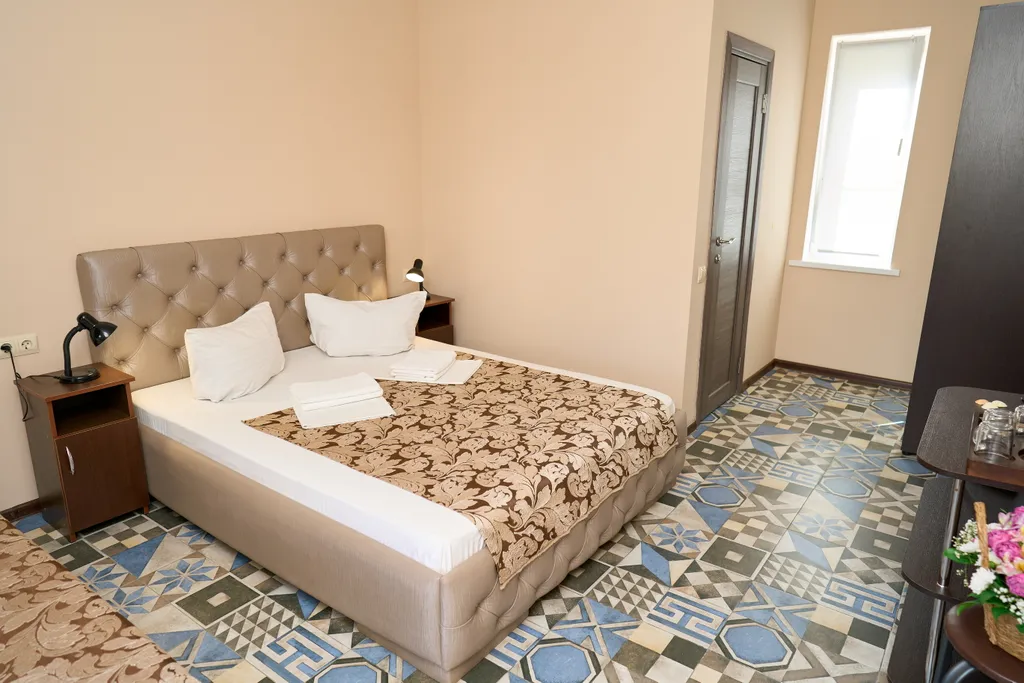 Квартира Квартира Трёхместный номер комфортный с 1 двуспальной кроватью и 1 односпальной — Кучугуры