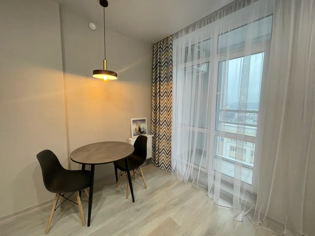 Панорамная квартира на верхнем этаже с видом на город