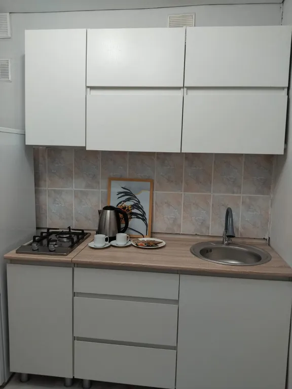 Квартира с видом на ели