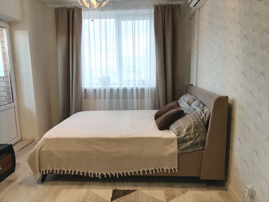 Квартира Квартира Уютная студия в пастельных тонах с панорамным видом на город — Краснодар