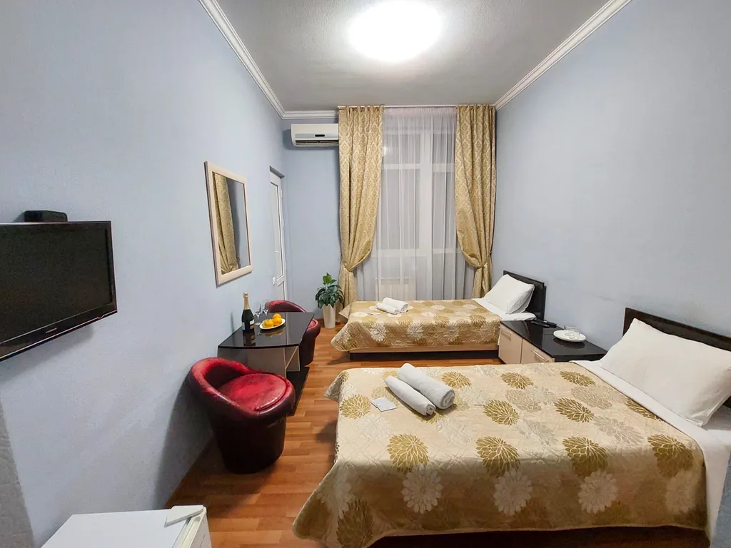 Двухместный номер с раздельными кроватями и балконом