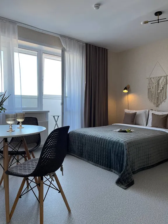 Уютная студия с видом на город