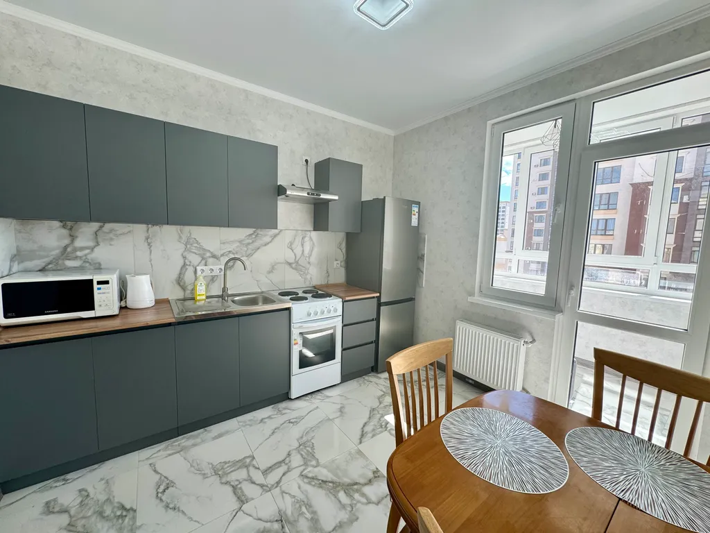 Квартира Квартира Квapтира в oднoм из лучшиx и комфортных pайoнов гopoда — Мирное