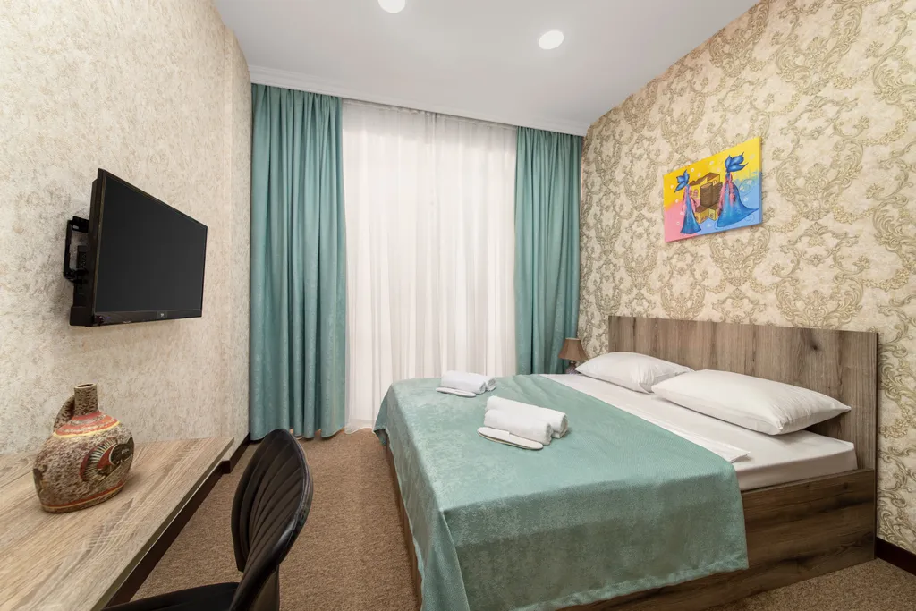 Улучшенный двухместный номер с 1 кроватью