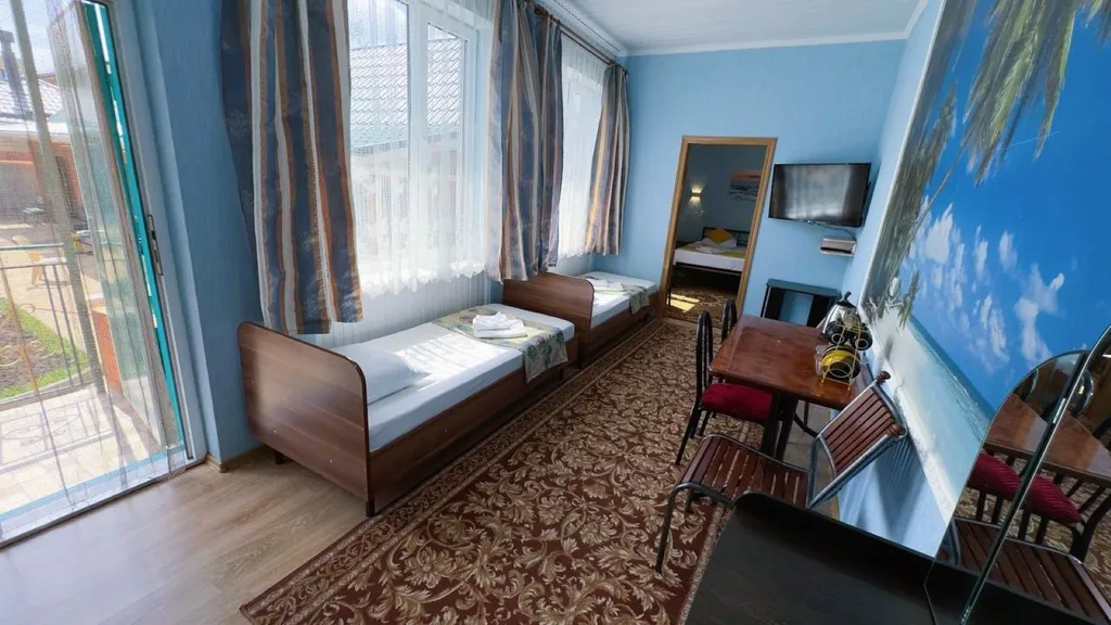 Двухкомнатный номер для 4-х гостей и дополнительным местом