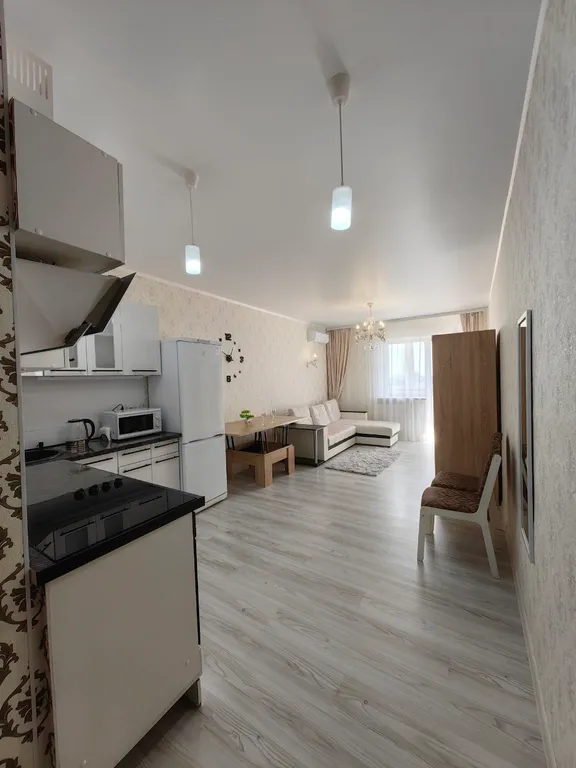 Уютная студия с видом на город