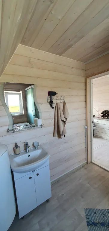 Тpеугольный дом A-frаmе с видом на море