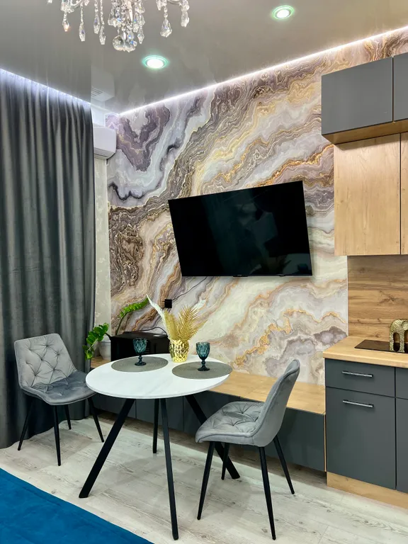 Новая квартира в центре города с видом на горы