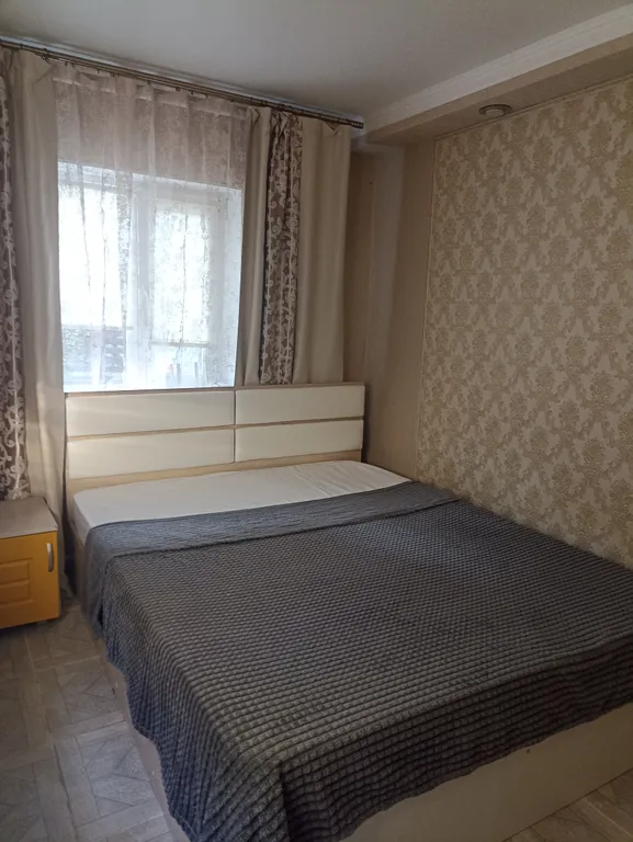 Квартира со своим двориком и стоянкой