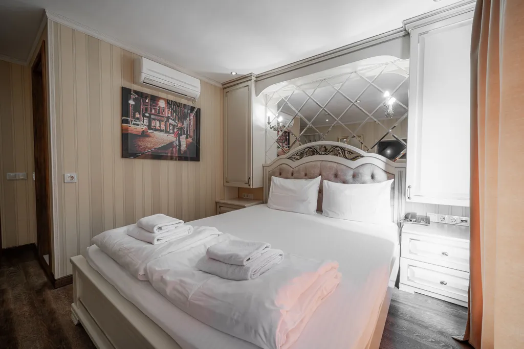 Двухместная комната с двуспальной кроватью НР