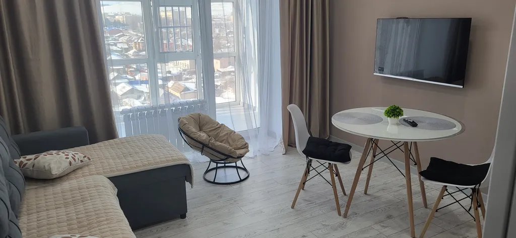 Комфортная квартира с панорамными окнами