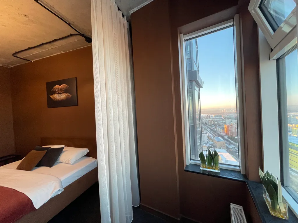 Роскошная квартира с видом на город с высоты птичьего полета