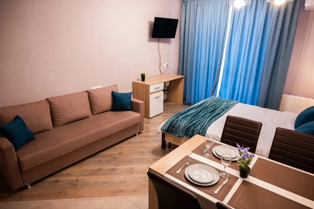 Уютная студия с дизайнерским ремонтом