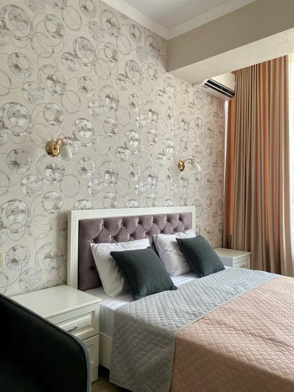 Двухкомнатная квартира с балконом в центре города